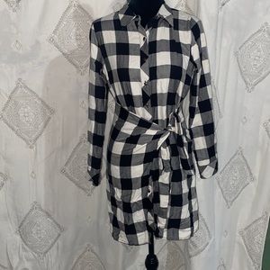 Small, long sleeve flannel dress, with belt.